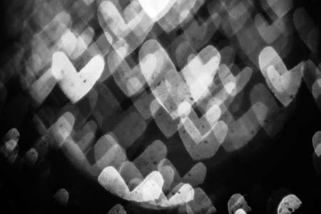 A black-and-white image of bokeh from a blurred lens for the background of your project.の写真素材