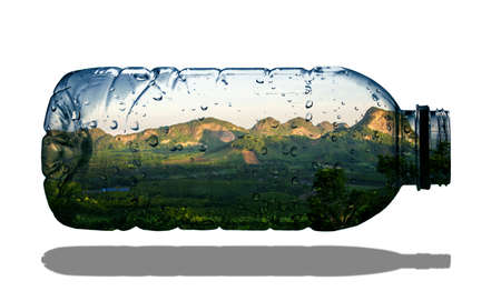 Natural concept design image in a clear bottle. The concept of plastic waste in nature