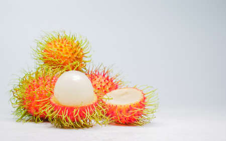 Ripe rambutan is delicious to eat. Rambutan on a white background. Thai fruit concept. rambutan sweet delicious fruit isolated on white backgroundの写真素材