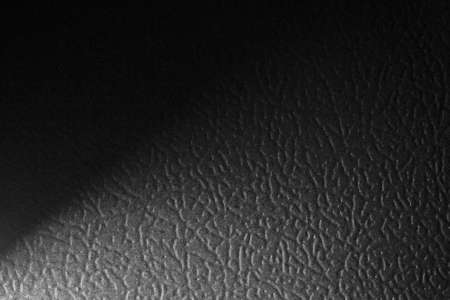 The background pattern of the metal plate looks for copy space.の写真素材