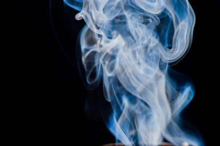 smoke moving background abstract pattern background on a black backgroundの写真素材