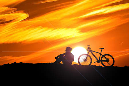 Mountain bikers are relaxing in the evening. Adventure riders in the evening. adventure travel conceptの写真素材