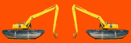A large yellow excavator or backhoe has buoyancy for working in the canal