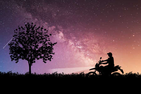 Silhouette of tourists adventuring with motorcycles, dirt bikes or motocross in the evenings. . travel and adventure conceptの写真素材