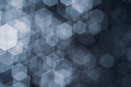Abstract background image of bokeh formed by hexagonal shape blur lens.の写真素材