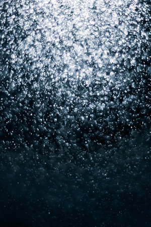 Water drops on a dark blue background. Abstract background with water drops.の写真素材