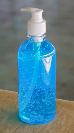 Bottle of alcohol gel placed at the entrance to the restaurant for use to wash your hands