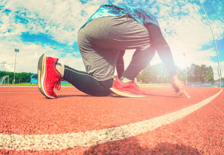 person running on the trackの写真素材