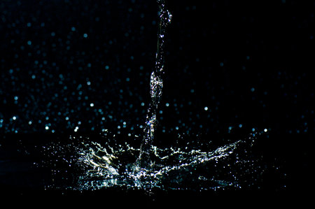 splashing water on a black backgroundの写真素材