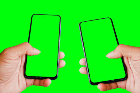 man's hand using a mobile phone blank screen for content copy space with clipping pathの写真素材