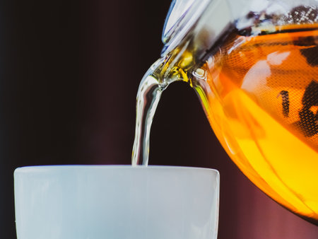 Pour hot tea into a healthy drink cup.の写真素材