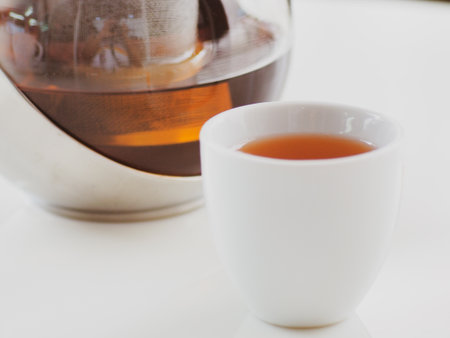 Pour hot tea into a healthy drink cup.の写真素材