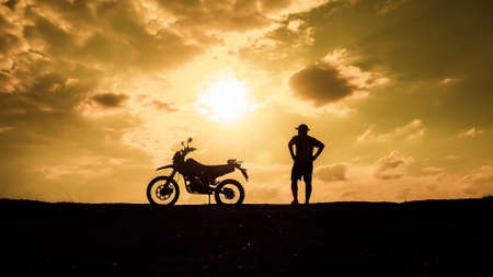 Tourists with motorcycles, motocross. Adventure tourists on motorcycles. men's holiday event ideasの写真素材