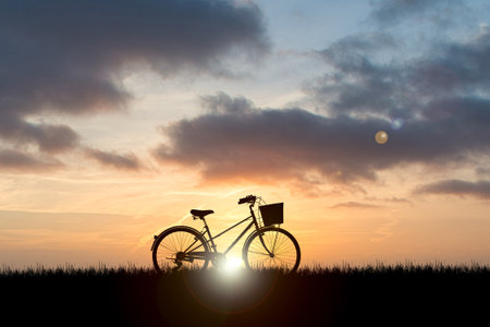 Running man silhouette in sunset time.  silhouette for a runner training in the evening. Sunsetsの写真素材