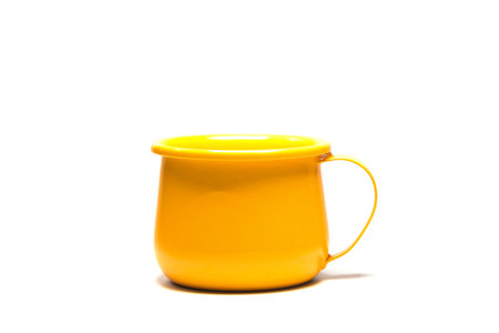 Zinc glass bright orange on a white background. Ideas for mock ups.

Blank mock up Empty classic undervest mug with neckline mockup, isolated.の写真素材
