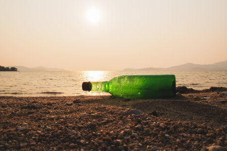 Trash bottles at the beach. garbage and pollution conceptの写真素材