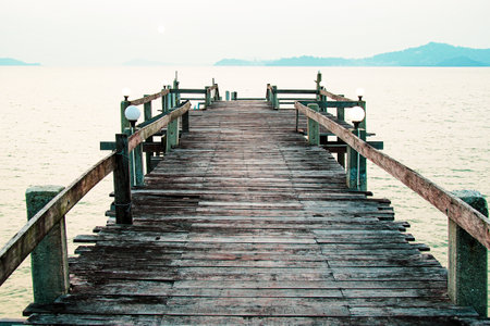 A wooden walkway that stretches into the sea. vacation travel conceptの写真素材
