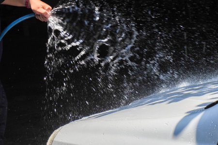 abstract background of water sprayed to wash the carの写真素材