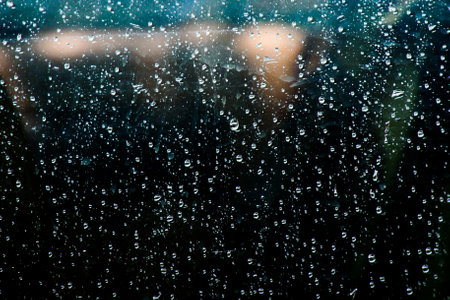 abstract background of water droplets stuck on glassの写真素材