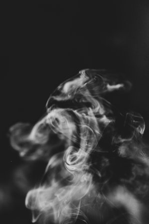 abstract background of smoke or fog on black backgroundの写真素材