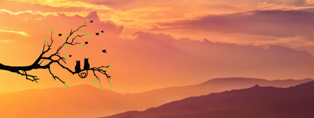 Silhouette of a cat couple on a branch, beautiful view. concept of love, couple, happinessの写真素材