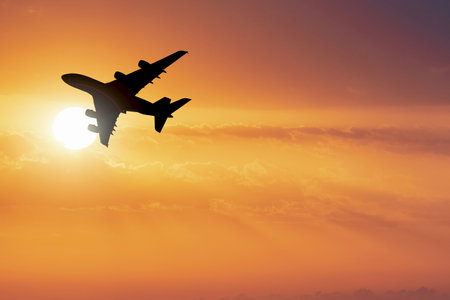 Passenger planes taking off from the airport. transportation and tourism conceptの写真素材