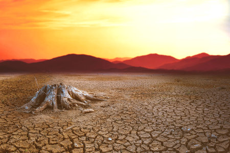 effect of global warming The land is broken and dry, the rain does not fall in season. concept of...