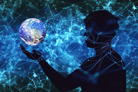 Concept of communication technology and internet networking. silhouette of a man with a globe in his...