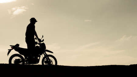 Tourists with motorcycles, motocross. Adventure tourists on motorcycles. men's holiday event ideasの写真素材