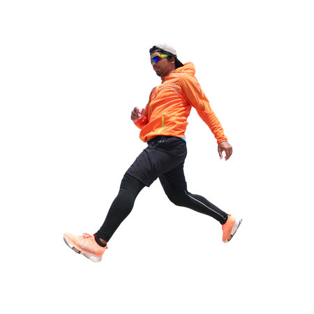Running man in orange sportswear, isolated on white background.の写真素材