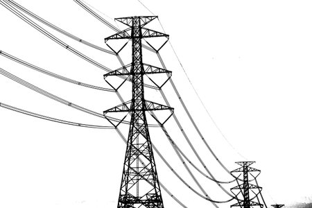 high voltage post High-voltage tower sky background black and whiteの写真素材
