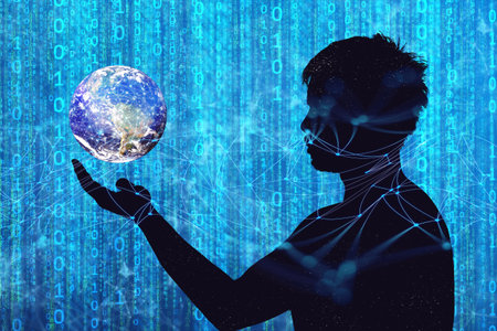 Concept of communication technology and internet networking. silhouette of a man with a globe in his handの写真素材