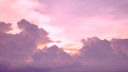 ** Beautiful sunset sky with vibrant pink and purple hues, featuring dramatic clouds for a tranquil and dreamy scene.

**の写真素材