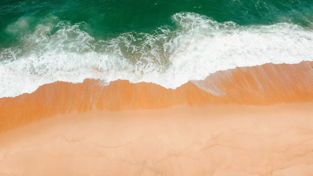 Aerial shot of a tranquil beach with golden sand and waves, capturing the essence of a serene...