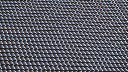 ** Detailed view of a traditional tiled roof showcasing a repetitive pattern and textured surface, captured in natural light.

**の写真素材