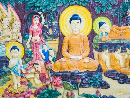 Buddha status on the wallの写真素材