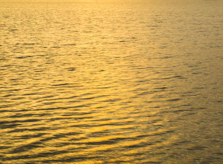 Golden rays of the sun on the river.の写真素材