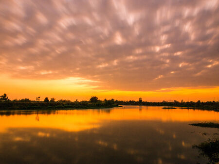 Clouds moving over the eveningの写真素材