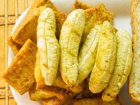 Banana toast on Brown bread slicesの写真素材