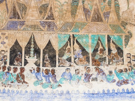 Painting on the wall of the church in the temple, the story about the old tradition, culture, local in the northeast region of Thailand.の写真素材