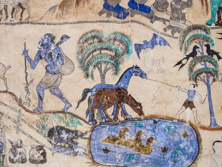 Painting on the wall of the church in the temple, the story about the old tradition, culture, local in the northeast region of Thailand.の写真素材