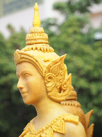 Candle wax carving angel Thai style in the traditional parade active festival Buddhist Lent in Nakhon Ratchasima, Thailand.の写真素材