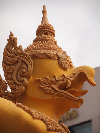 Candle wax carving angel Thai style in the traditional parade active festival Buddhist Lent in Nakhon Ratchasima, Thailand.の写真素材