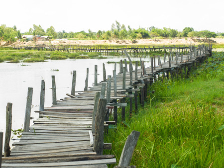 Kae Dam way back home is the old wooden.の写真素材