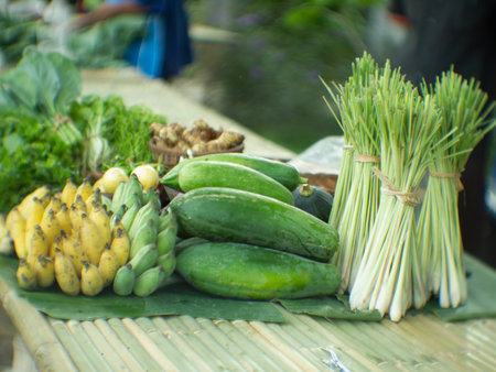 Cucumber and other vegetables for sale in a local market.の写真素材