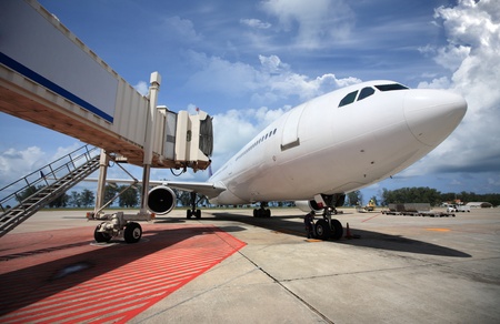 Parked aircraft parked in the airport waiting for passengers の写真素材