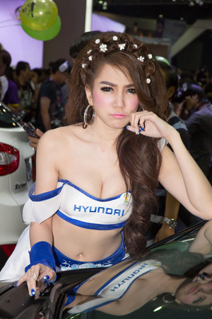 Pretty woman, BANGKOK - April 6   Unidentified model  on display at The 35th Bangkok International Motor Show on April 6, 2014 in Bangkok, Thailandのeditorial素材