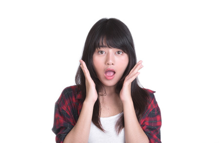 Portrait of a surprised girlの写真素材