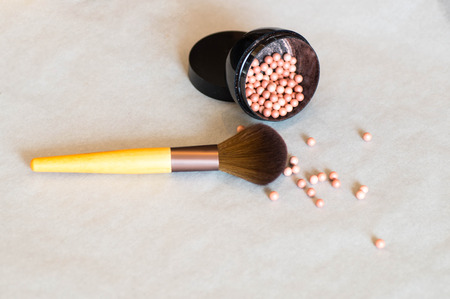 Fully visible makeup brush with highlighter beadsの写真素材