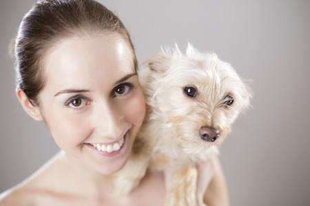 Happy woman with dogの写真素材